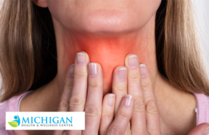 Woman with inflamed thyroid